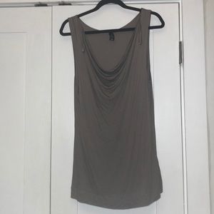 Sleeveless gray shirt with cowl/scoop neck
